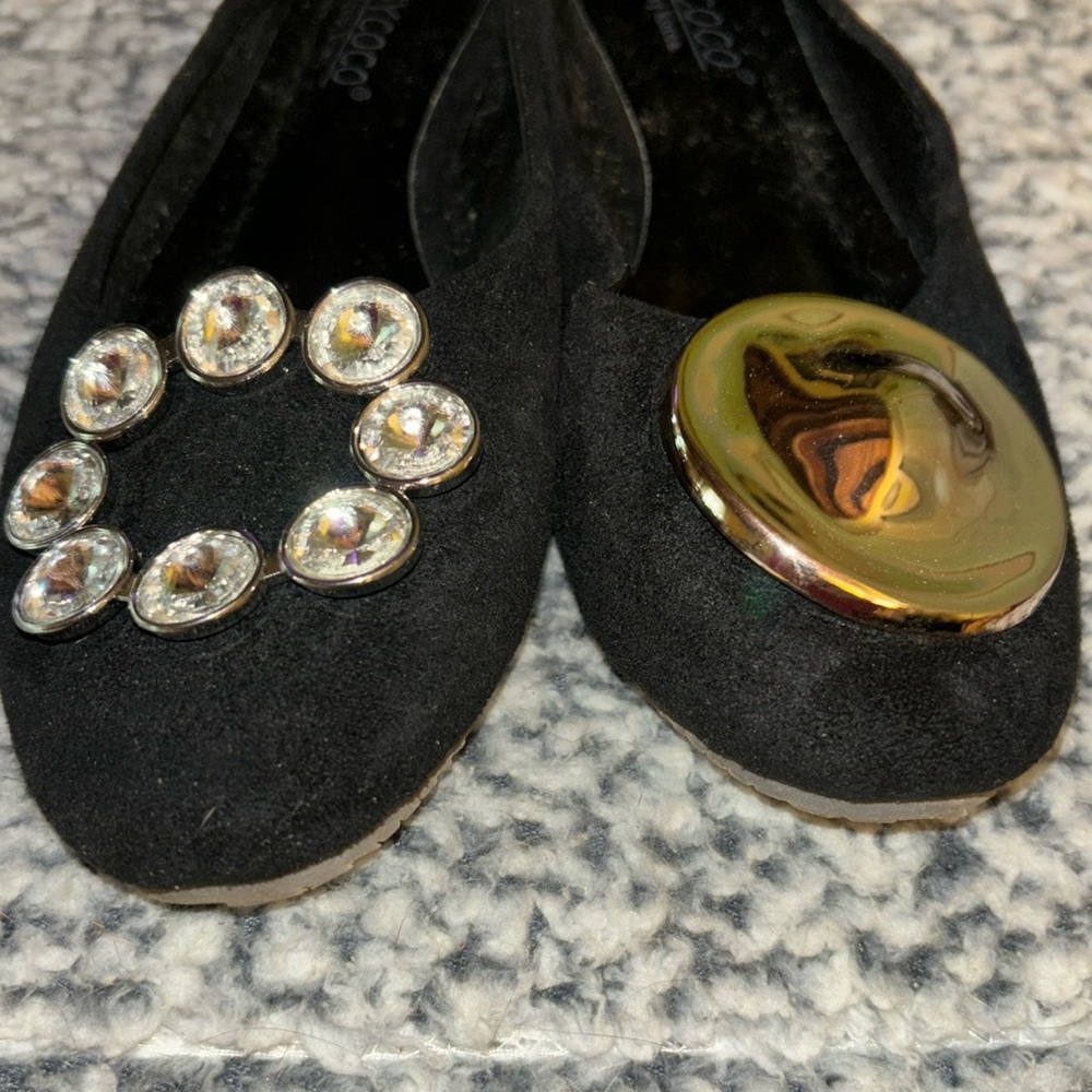 Ladies size 6/6.5 black ultra suede flats with asymmetric embellishment